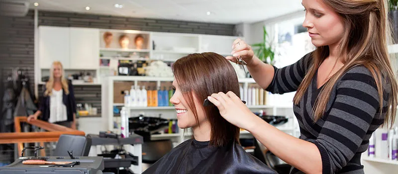 Woman business owner at her beauty salon