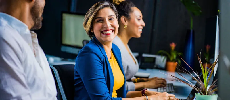 Women entrepreneur and business owner at desk
