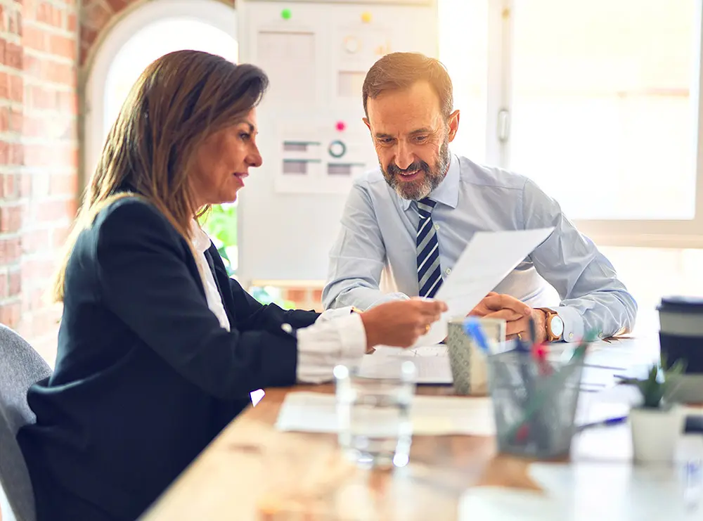 Business owner meeting with an accountant to review financial documents