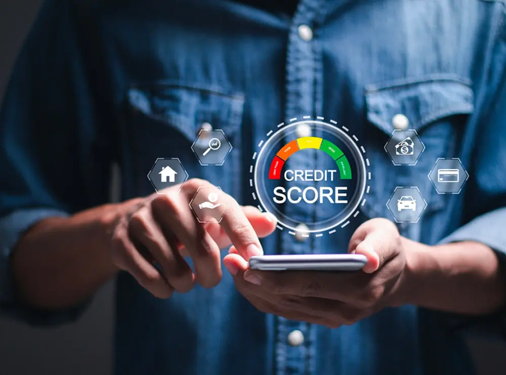 Small business owner checking credit score and financial records for a loan application